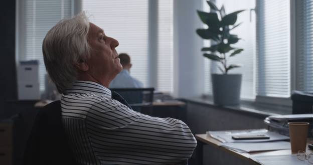 Older man annoyed at work - Age Discrimination